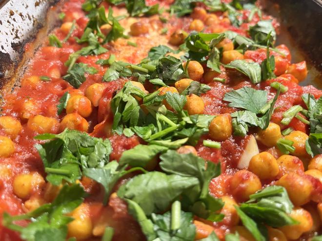 Baked feta with tomatoes and chickpeas