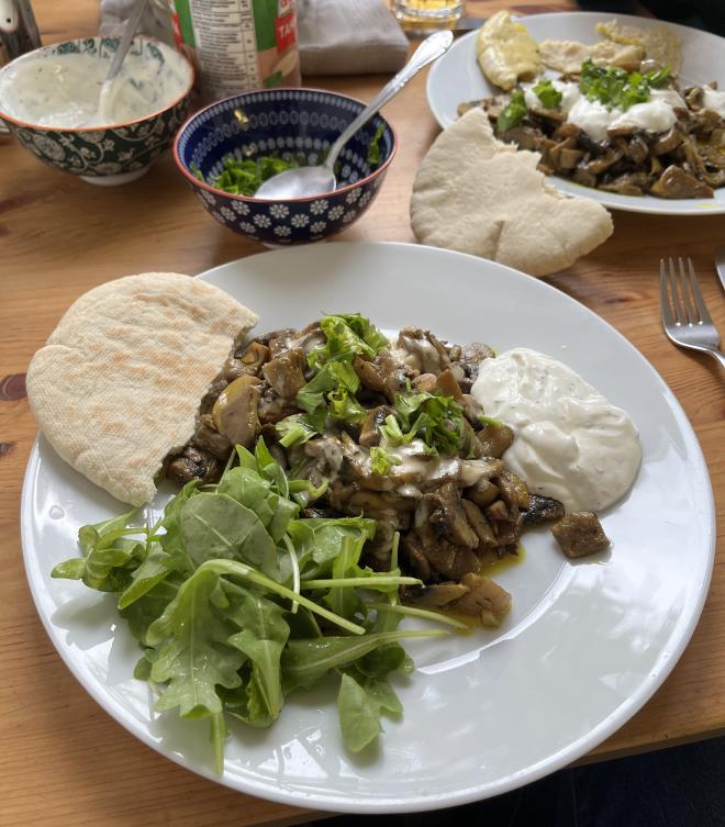 Mushroom shawarma with tahina, tzatziki and pita - plus some rocket here