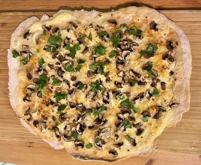 Tarte flambée with mushrooms and onions